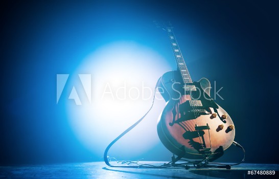 Picture of Electric guitar on a blue background